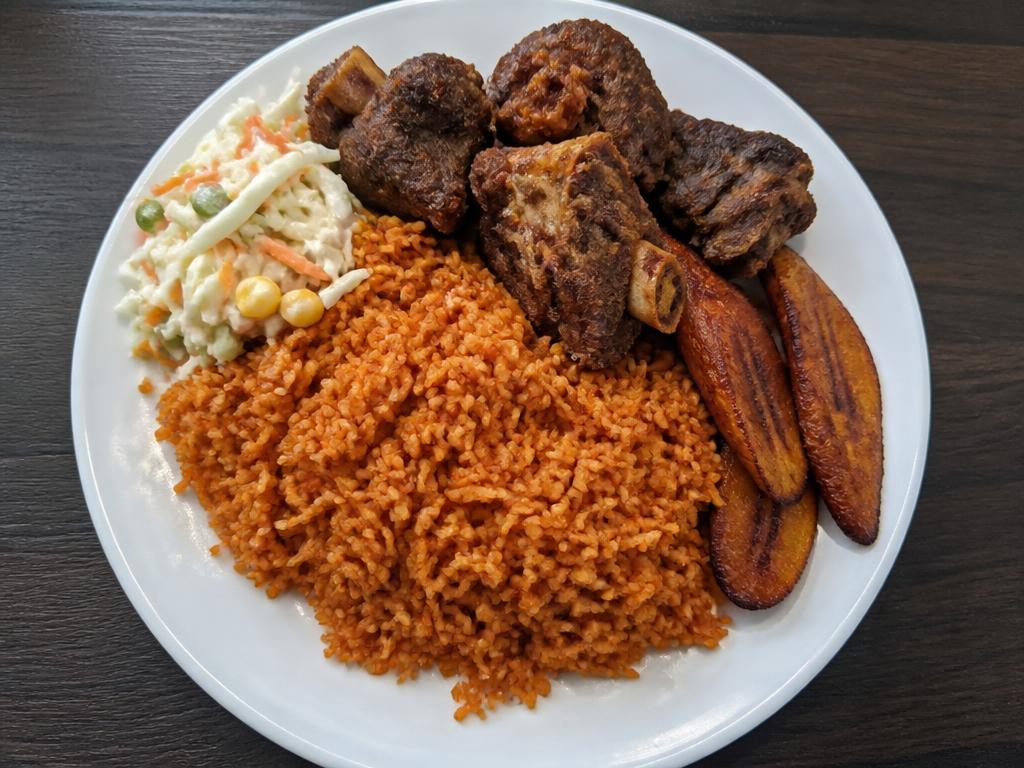 Jollof Rice with Fried Goat — Nigerian